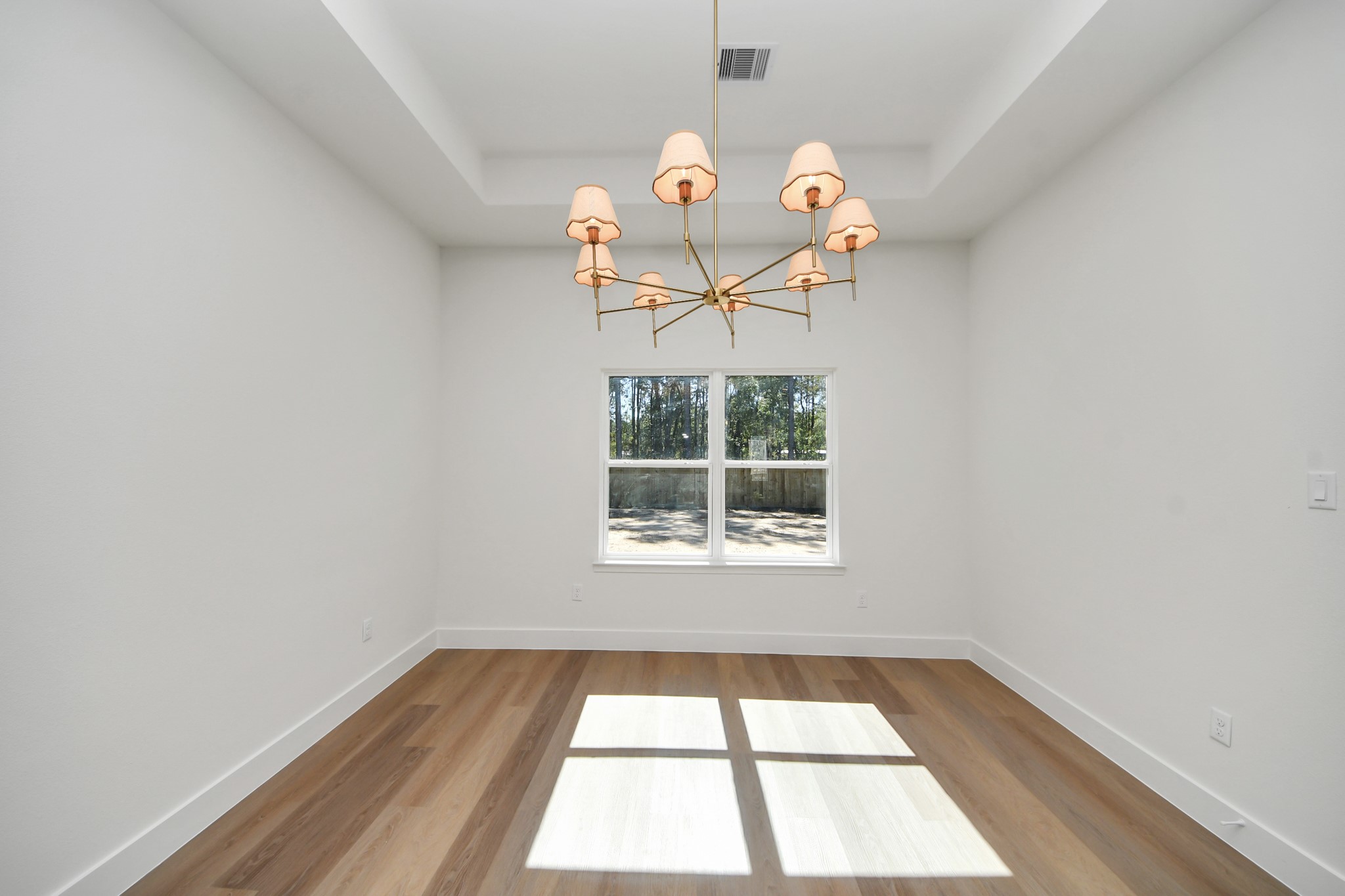 16276 Jeet Street Conroe, TX 77306 - Photo 12 of 36 an empty room with a window