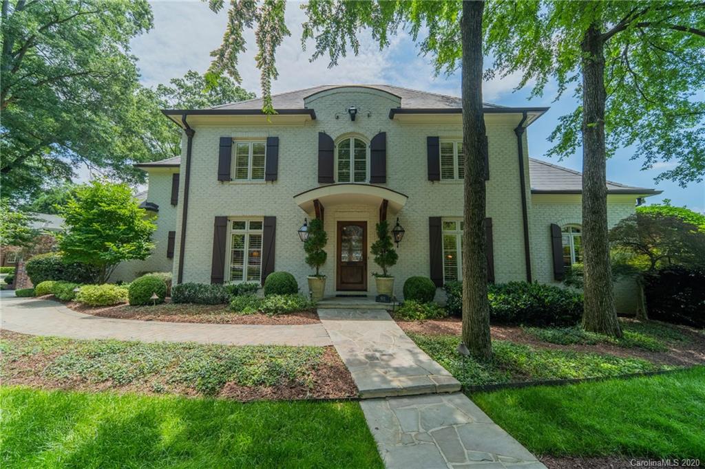 901 Colville Road Charlotte, NC 28207 - Photo 2 of 48 a front view of a house with garden