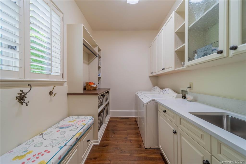 901 Colville Road Charlotte, NC 28207 - Photo 17 of 48 a room with a sink and a window