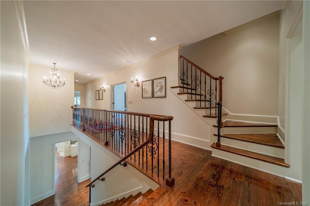 901 Colville Road Charlotte, NC 28207 - Photo 22 of 48 a view of entryway with wooden floor