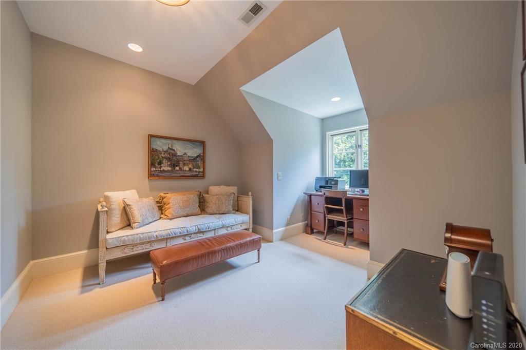 901 Colville Road Charlotte, NC 28207 - Photo 28 of 48 a bedroom with furniture and a wooden floor