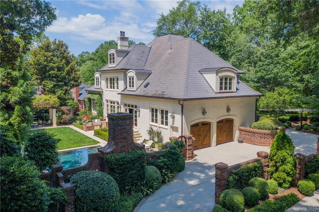 901 Colville Road Charlotte, NC 28207 - Photo 39 of 48 a aerial view of a house with a yard plants and large tree