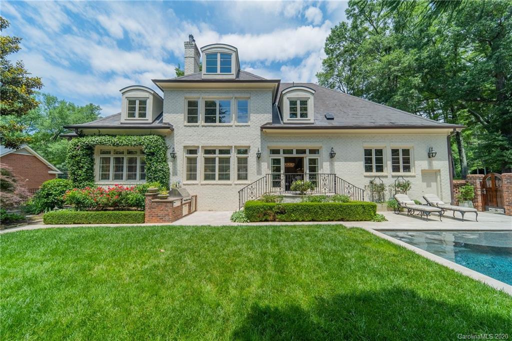 901 Colville Road Charlotte, NC 28207 - Photo 45 of 48 a front view of a house with a yard