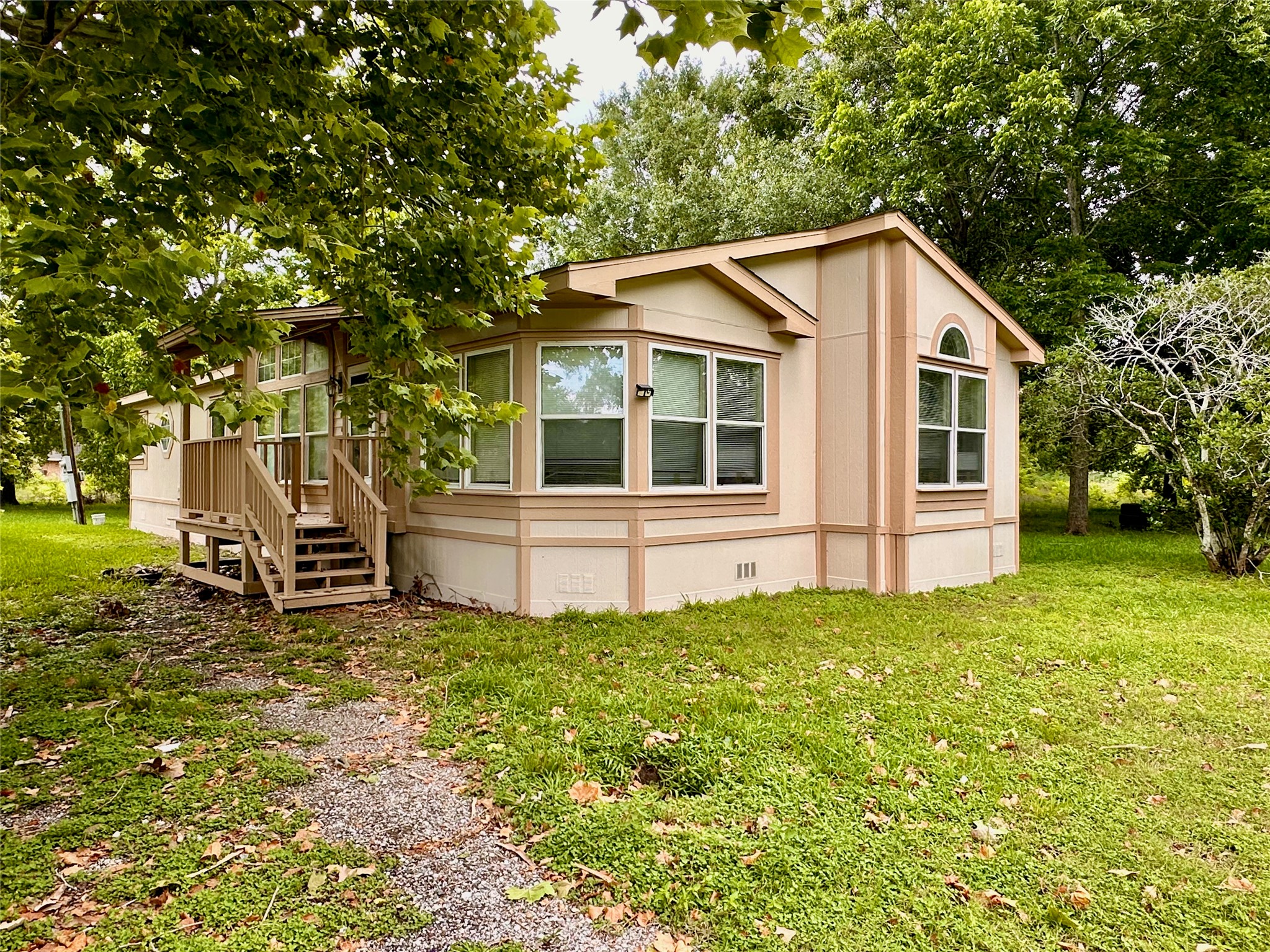 202 Main Street Fresno, TX 77545 - Photo 2 of 26 a view of a house with a yard