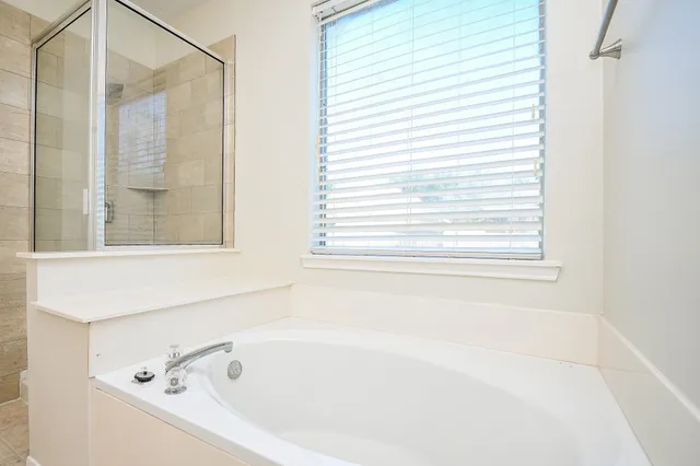 a bathroom with a sink a vanity and a mirror