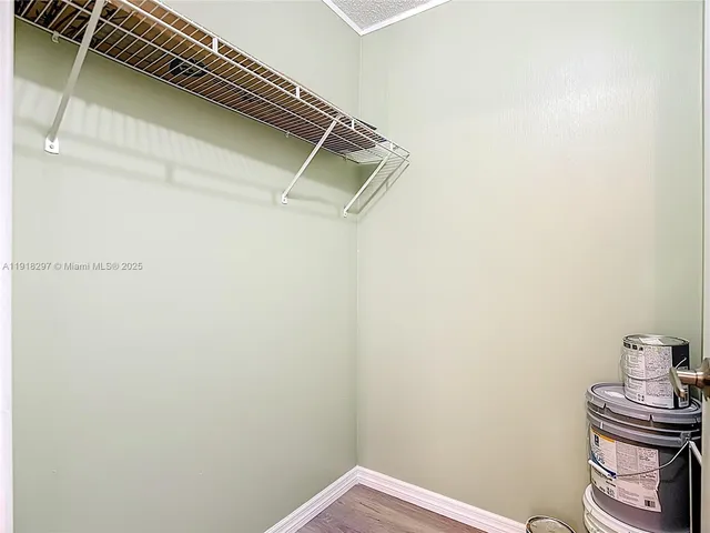 a front view of house with yard and swimming pool