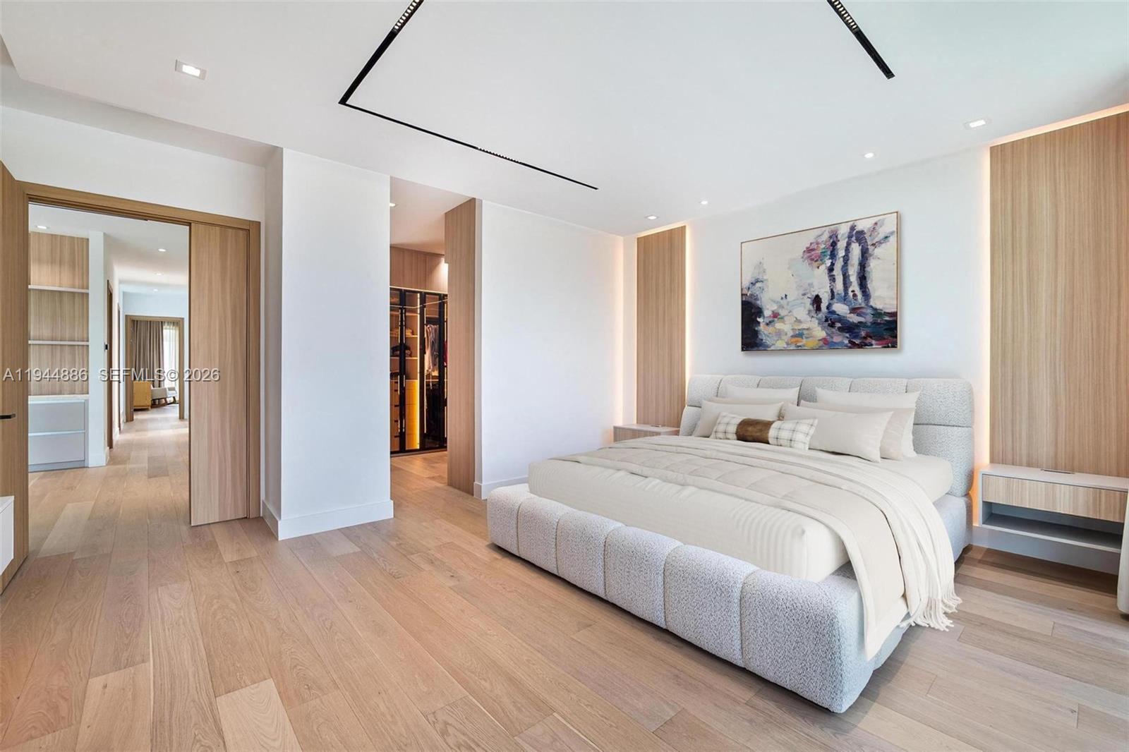 1344 Southwest 16th Street Miami, FL 33145 - Photo 12 of 37 a spacious bedroom with a bed and a painting on the wall