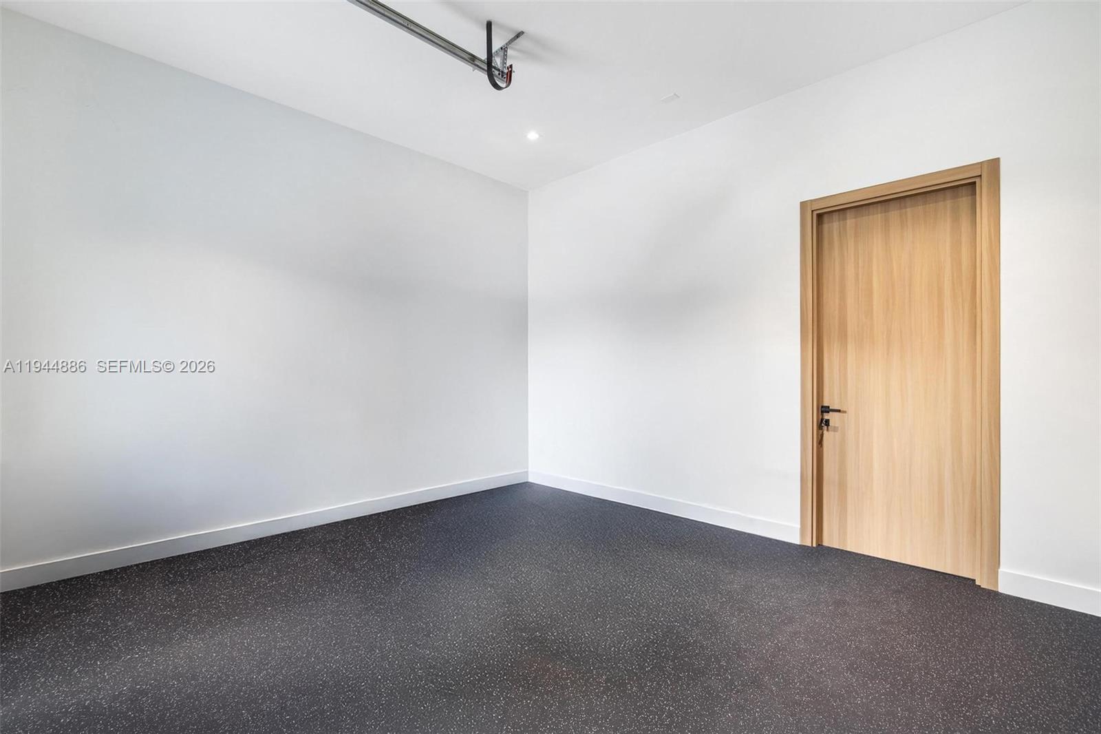 1344 Southwest 16th Street Miami, FL 33145 - Photo 23 of 37 an empty room with a ceiling fan and window