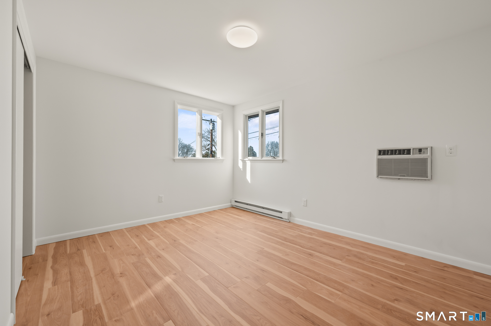 90 Pinnacle Road Plainville, CT 06062 - Photo 11 of 38 an empty room with windows