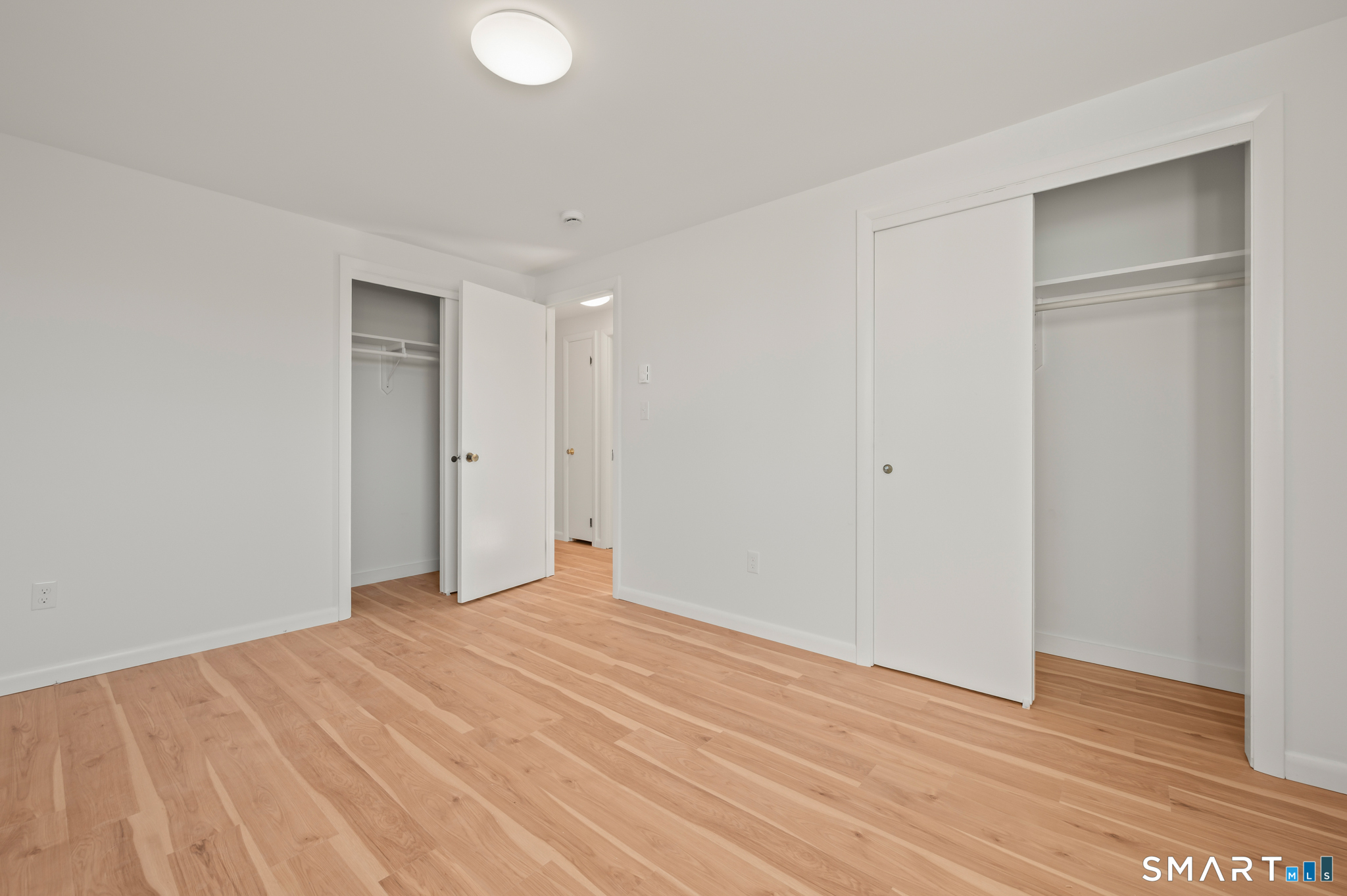 90 Pinnacle Road Plainville, CT 06062 - Photo 13 of 38 a view of empty room with wooden floor