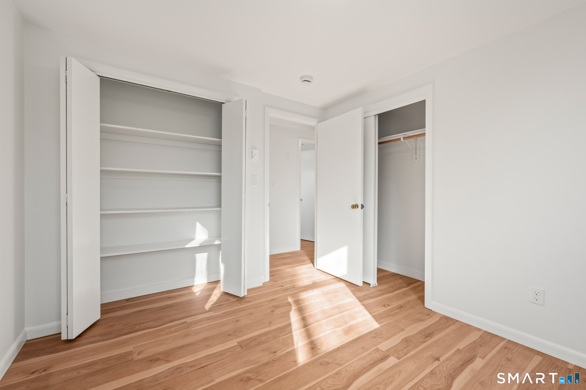 90 Pinnacle Road Plainville, CT 06062 - Photo 16 of 38 a view of a room with wooden floor and closet