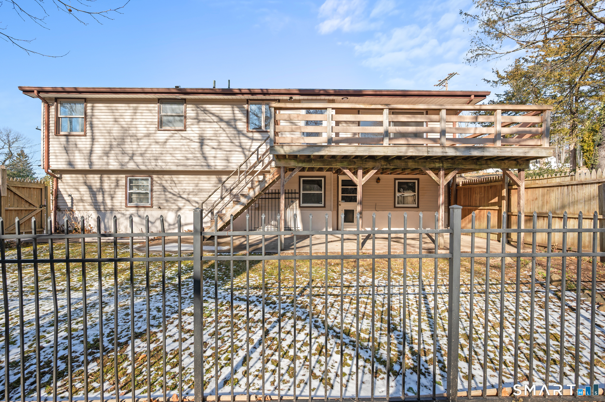 90 Pinnacle Road Plainville, CT 06062 - Photo 37 of 38 a view of a balcony with wooden floor and city view