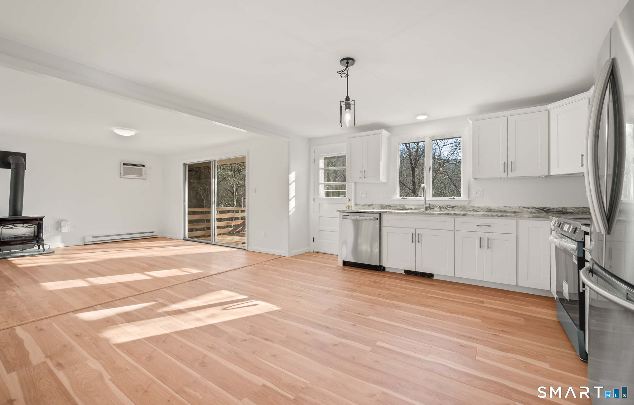 90 Pinnacle Road Plainville, CT 06062 - Photo 9 of 38 a kitchen with stainless steel appliances granite countertop a sink stove and refrigerator