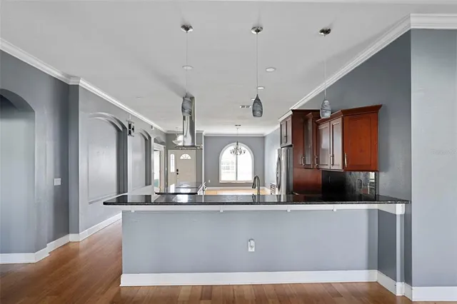 a view of living room with furniture and a window