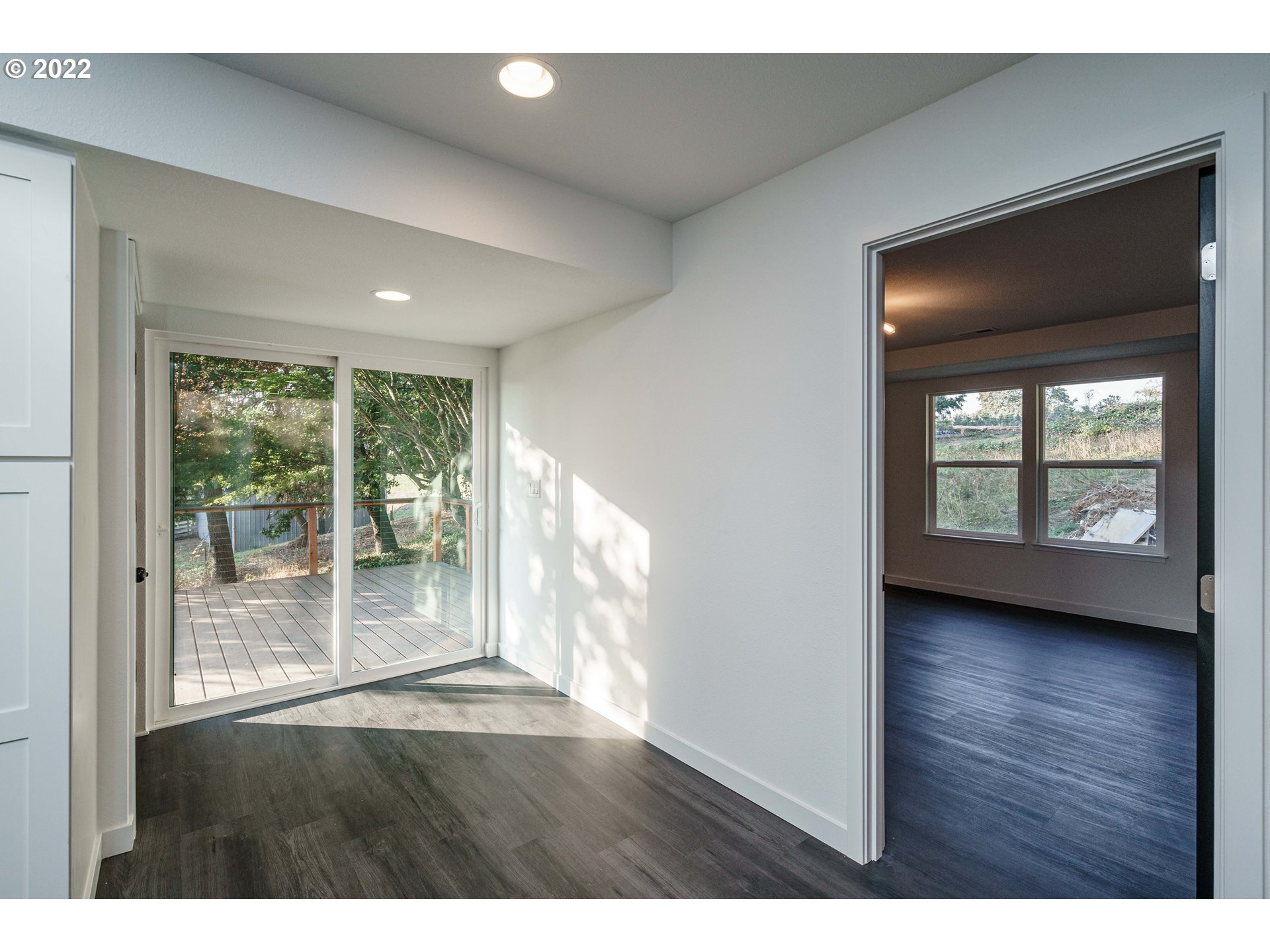 28371 Southeast KW Anderson Road Gresham, OR 97080 - Photo 11 of 32 a view interior of a house wooden floor and windows