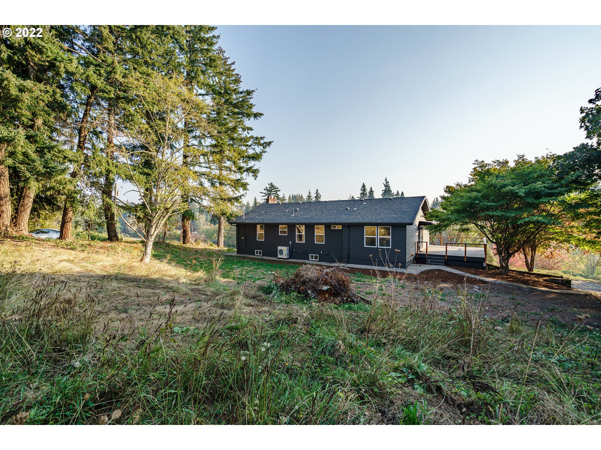 28371 Southeast KW Anderson Road Gresham, OR 97080 - Photo 26 of 32 a view of a house with a yard