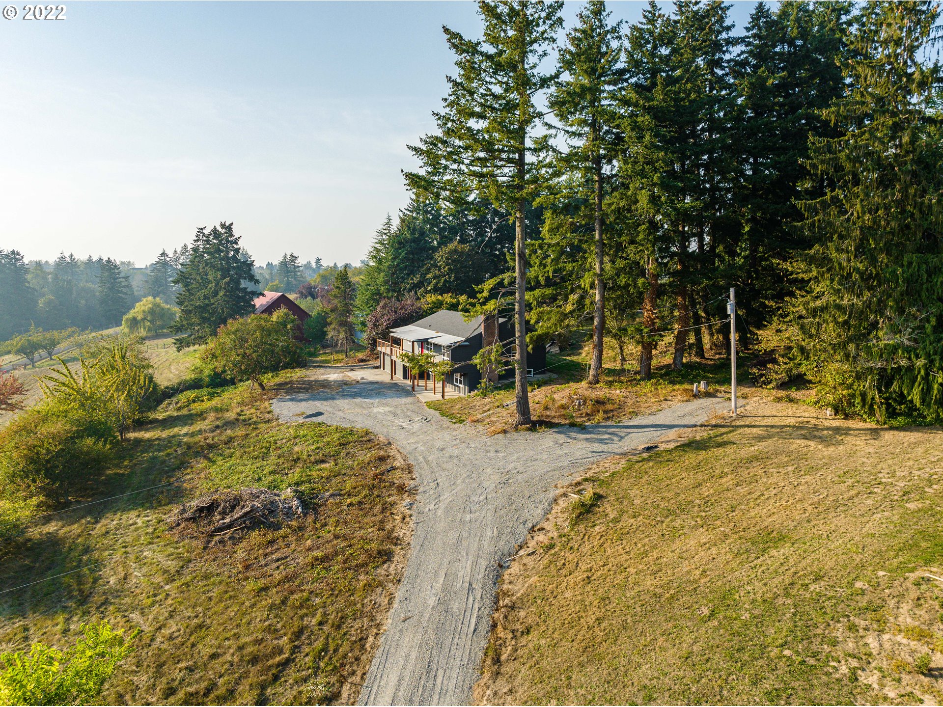 28371 Southeast KW Anderson Road Gresham, OR 97080 - Photo 28 of 32 a view of a swimming pool with an outdoor space