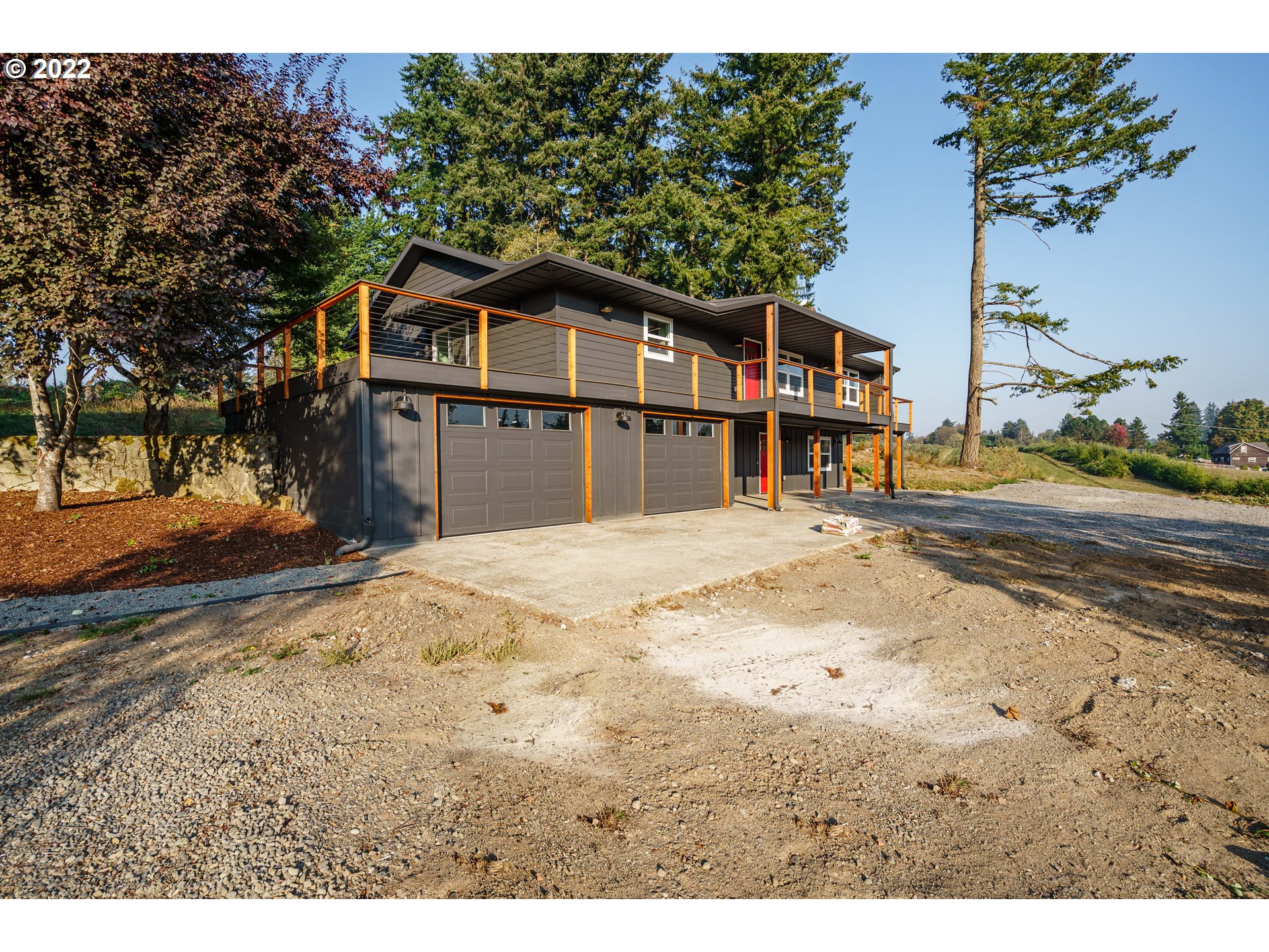 28371 Southeast KW Anderson Road Gresham, OR 97080 - Photo 4 of 32 a front view of a house with a yard