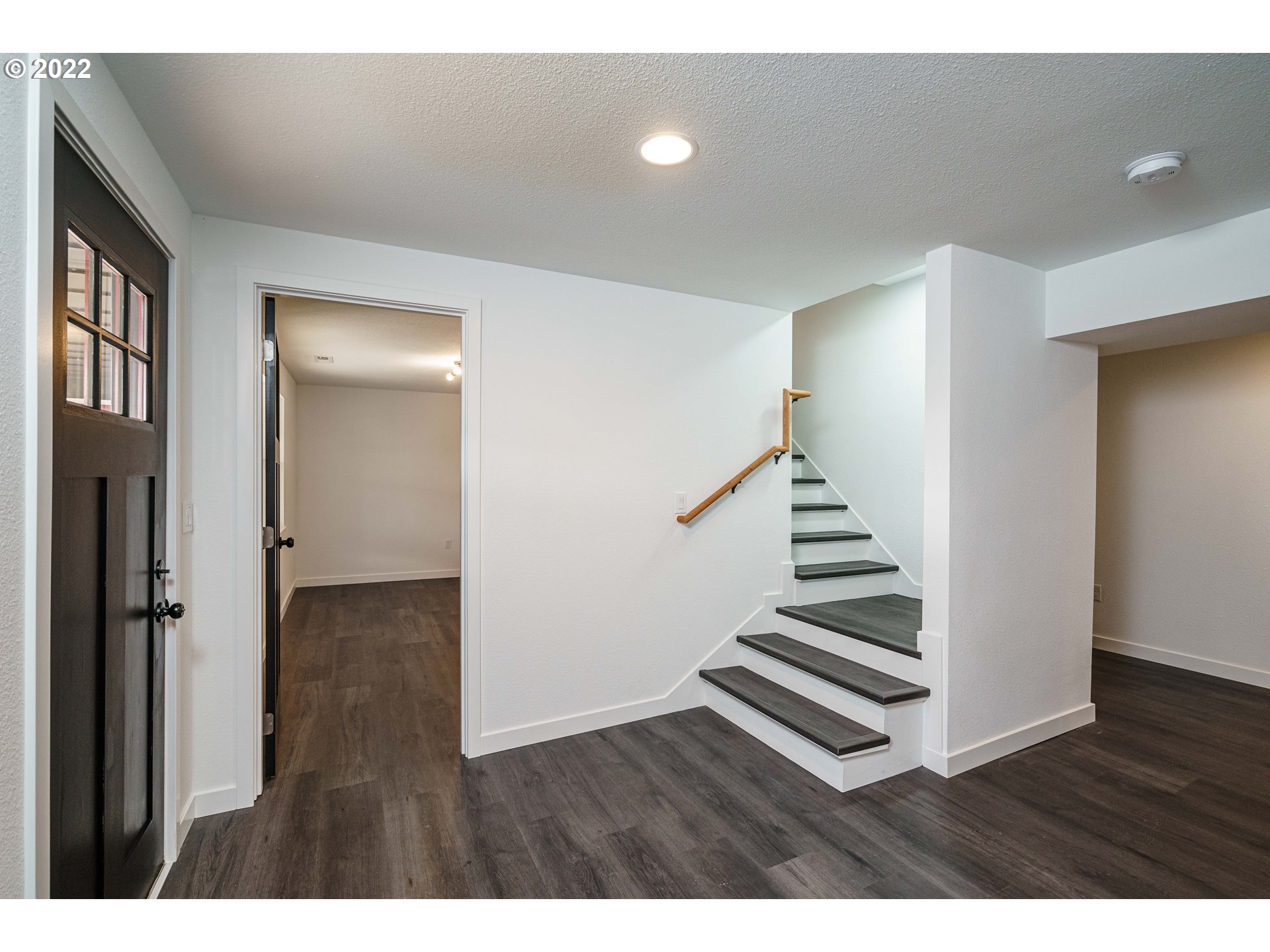 28371 Southeast KW Anderson Road Gresham, OR 97080 - Photo 5 of 32 a view interior of a house with wooden floor and stairs