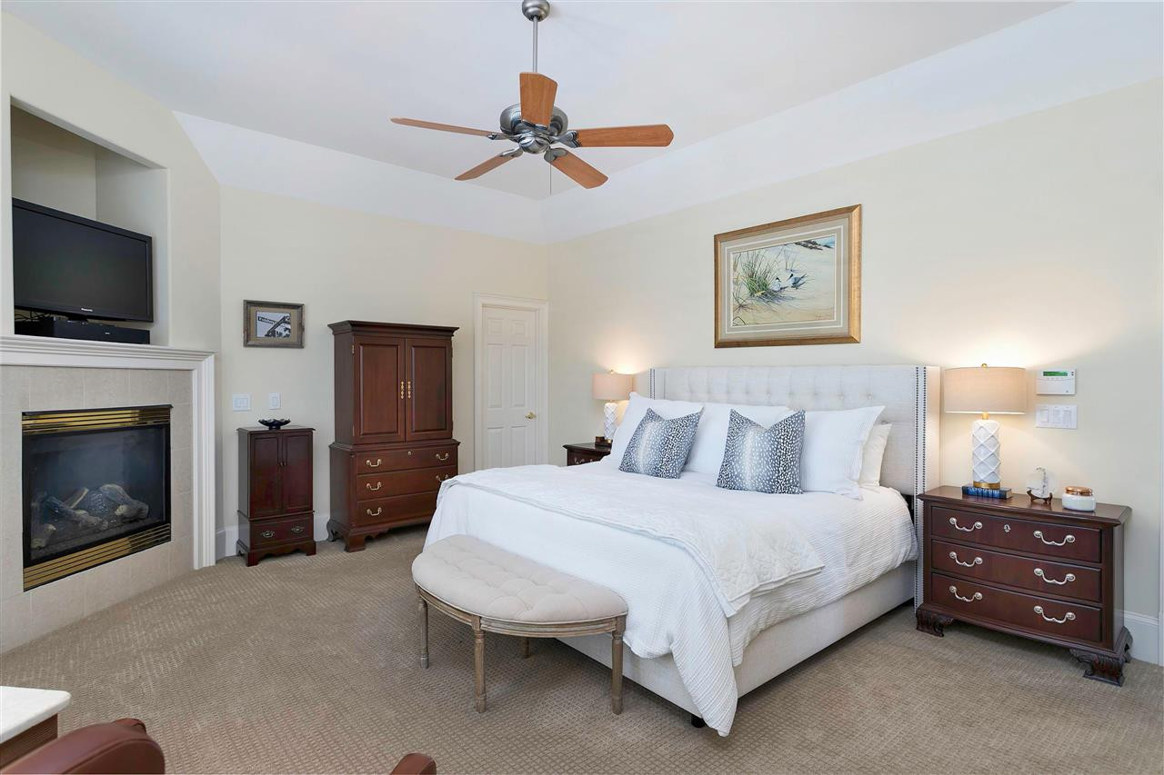 10517 Beckridge Lane Raleigh, NC 27615 - Photo 12 of 30 Main Floor Master Bedroom with Fireplace
