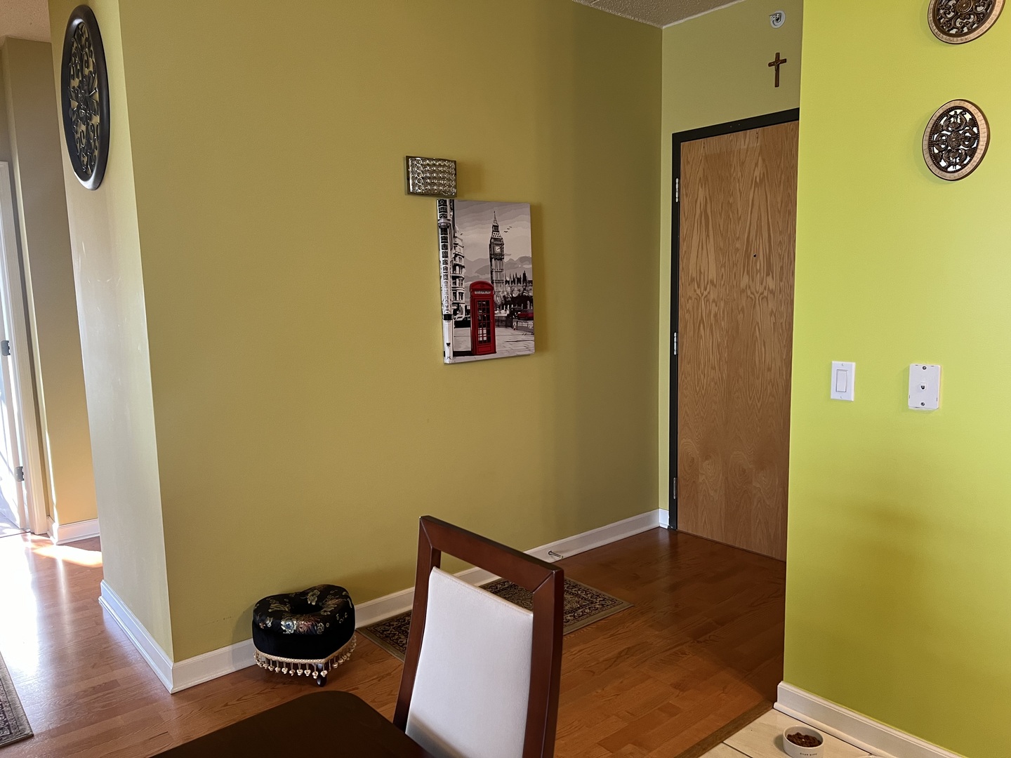 9355 Irving Park Road, Unit 522 Schiller Park, IL 60176 - Photo 11 of 24 a view of a door and chair in a room