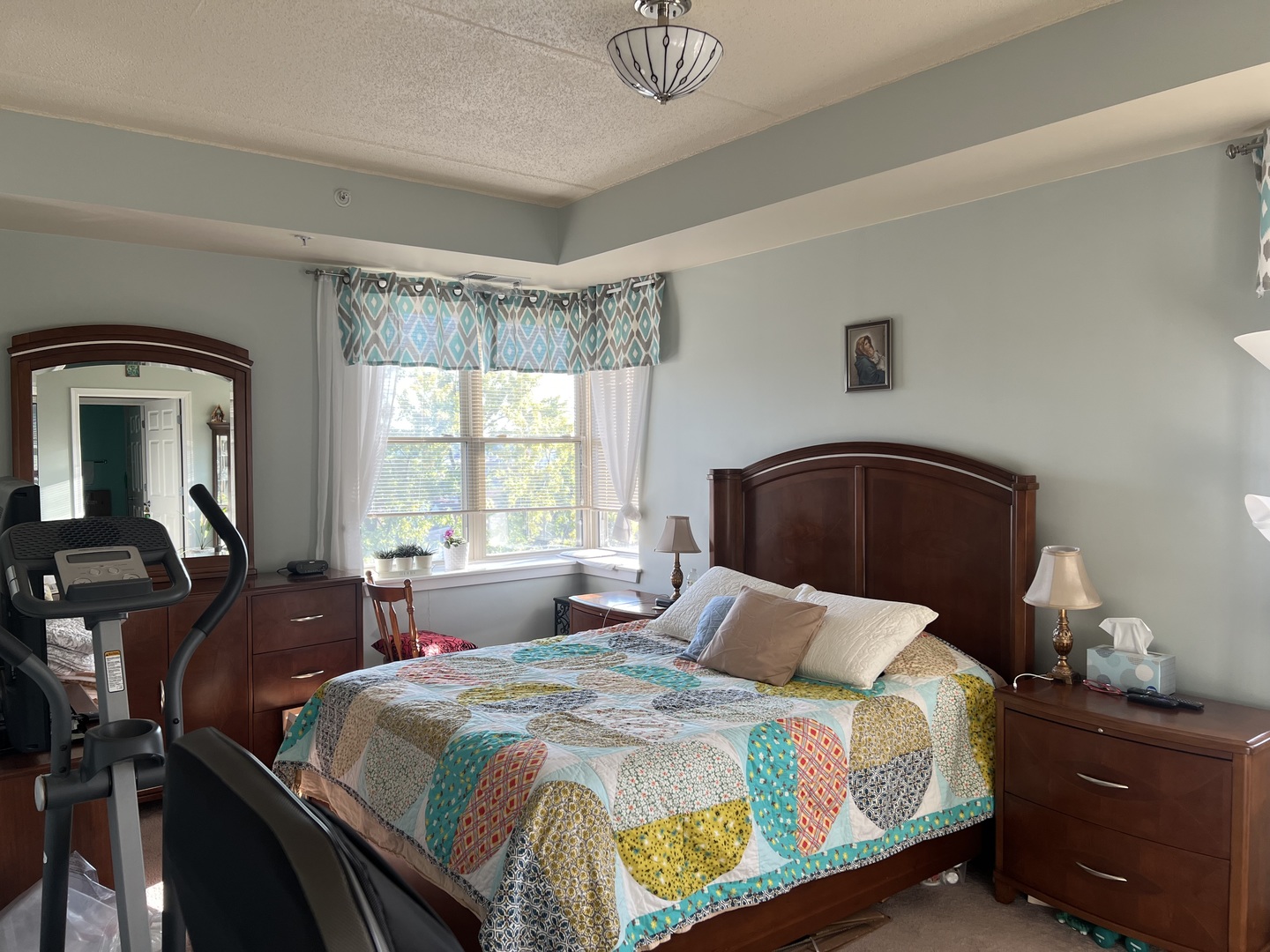 9355 Irving Park Road, Unit 522 Schiller Park, IL 60176 - Photo 15 of 24 a bedroom with a bed and window