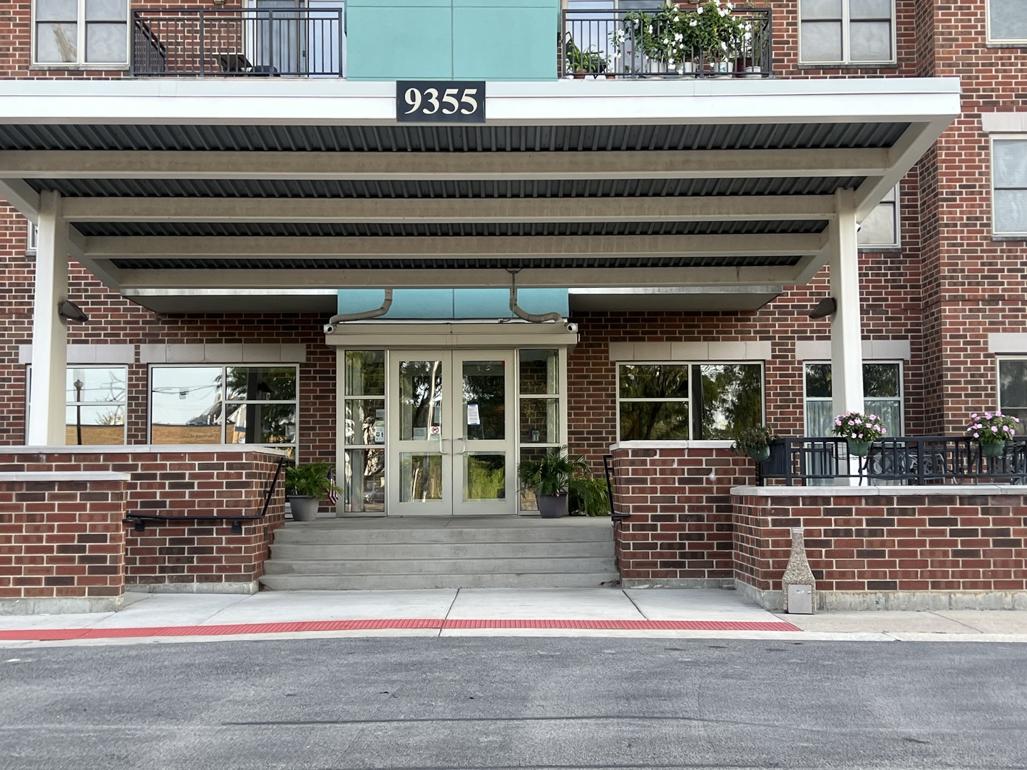9355 Irving Park Road, Unit 522 Schiller Park, IL 60176 - Photo 2 of 24 a front view of a house with entryway