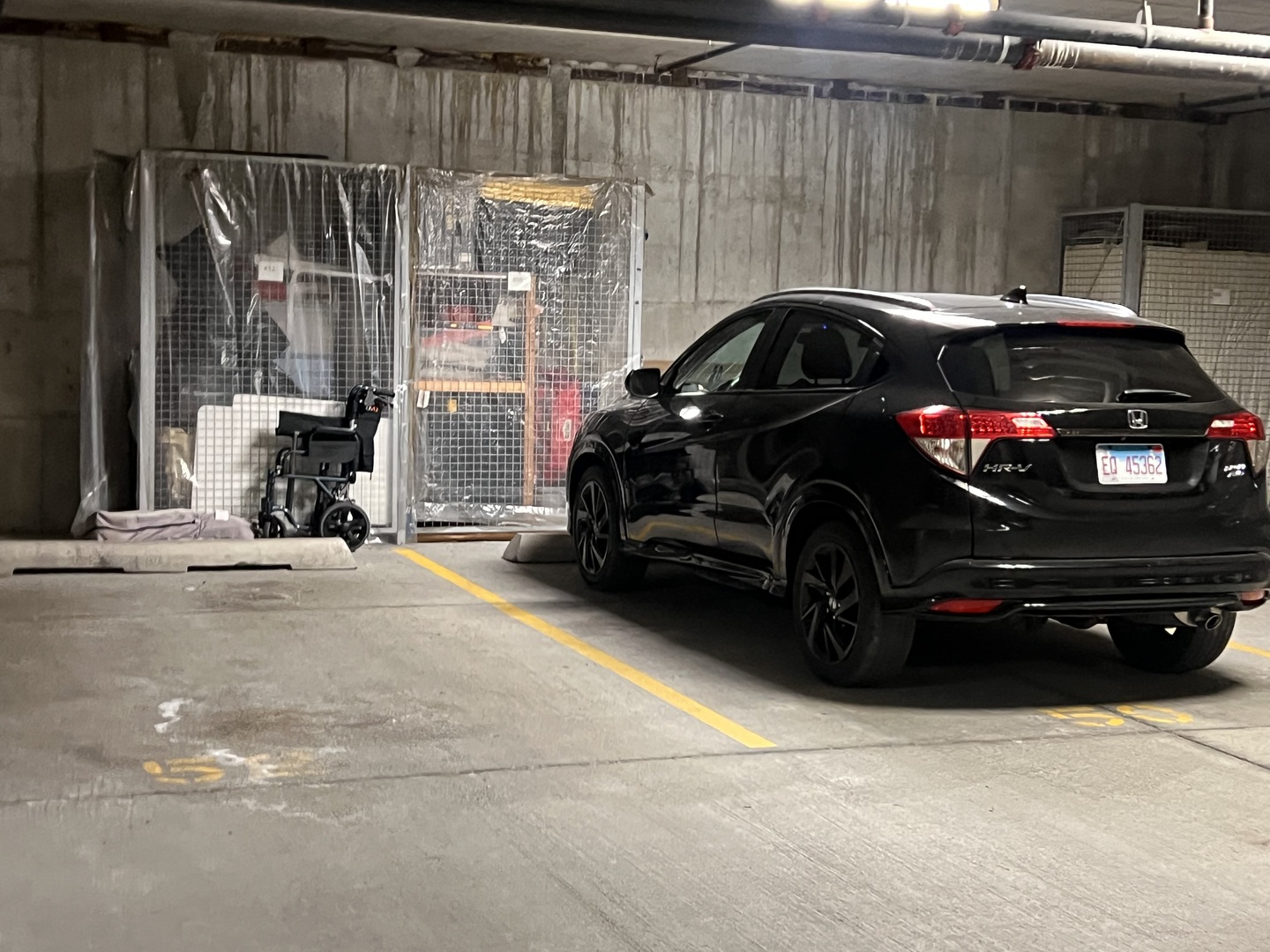 9355 Irving Park Road, Unit 522 Schiller Park, IL 60176 - Photo 21 of 24 a view of a car parked in front of a house