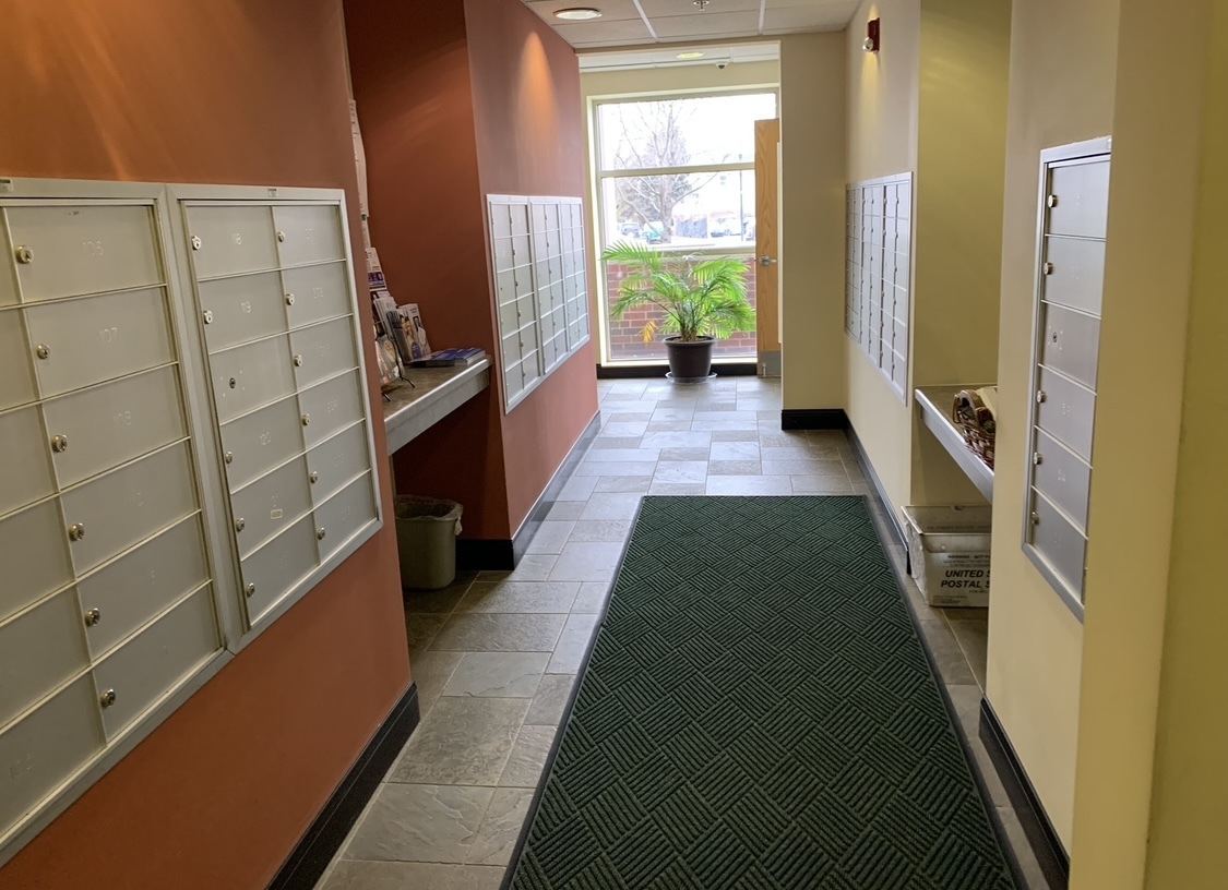 9355 Irving Park Road, Unit 522 Schiller Park, IL 60176 - Photo 6 of 24 a view of hallway with wooden floor and stairs