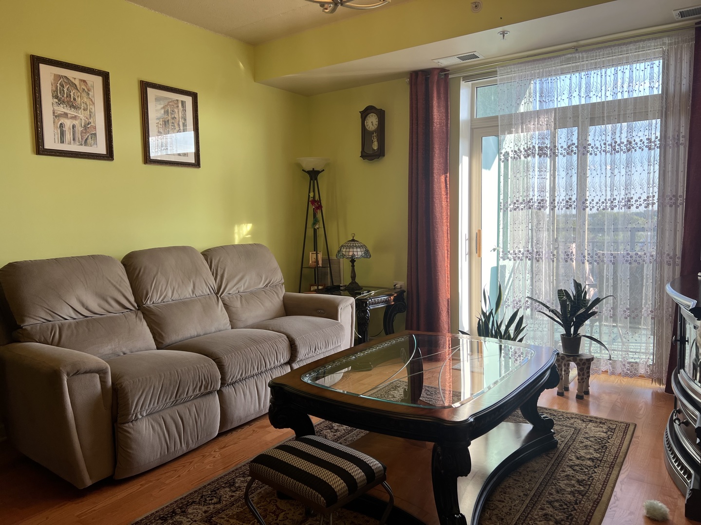 9355 Irving Park Road, Unit 522 Schiller Park, IL 60176 - Photo 10 of 24 a living room with furniture and a window