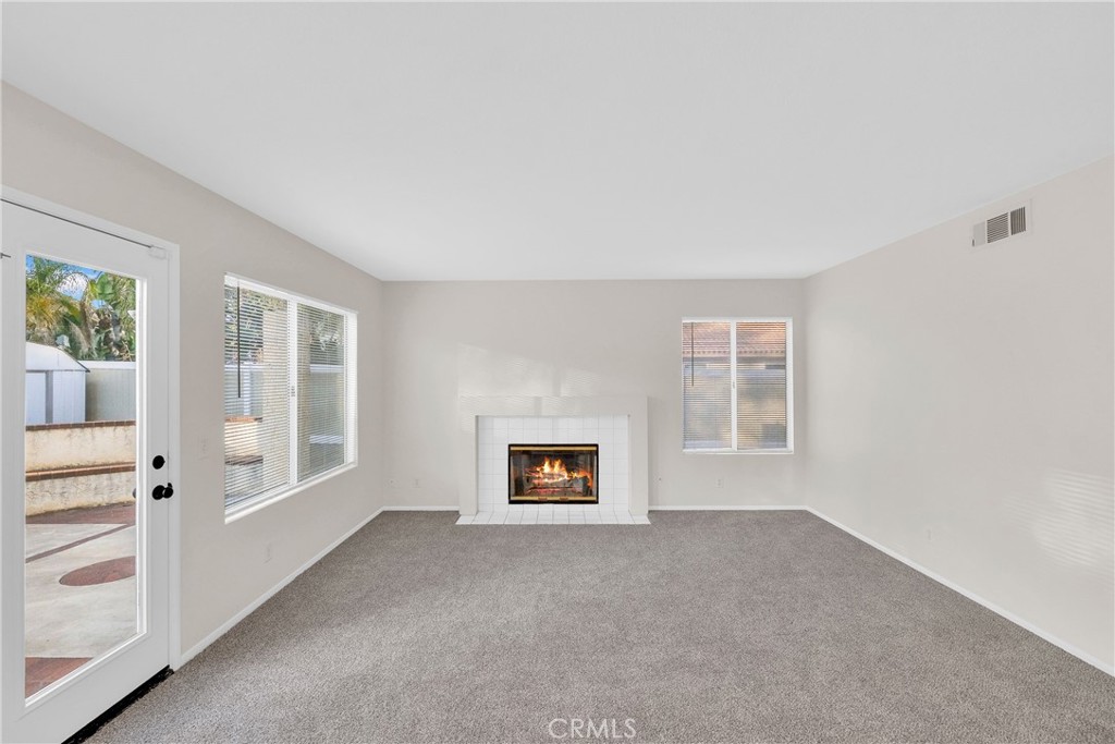 9253 Sunridge Drive Riverside, CA 92508 - Photo 17 of 54 a view of an empty room with a window