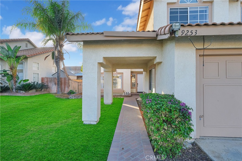 9253 Sunridge Drive Riverside, CA 92508 - Photo 2 of 54 a front view of a house with garden