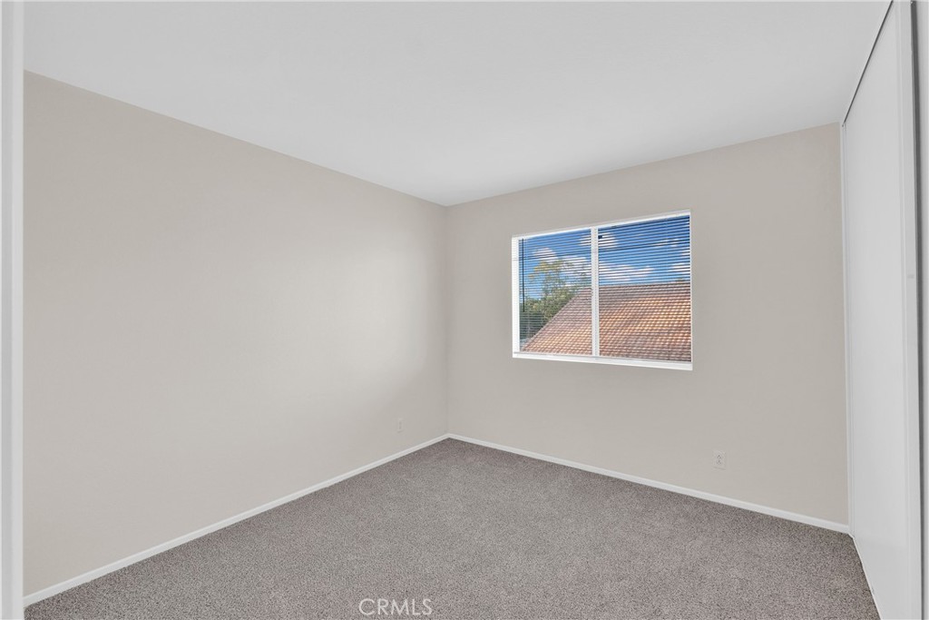 9253 Sunridge Drive Riverside, CA 92508 - Photo 35 of 54 an empty room with a window