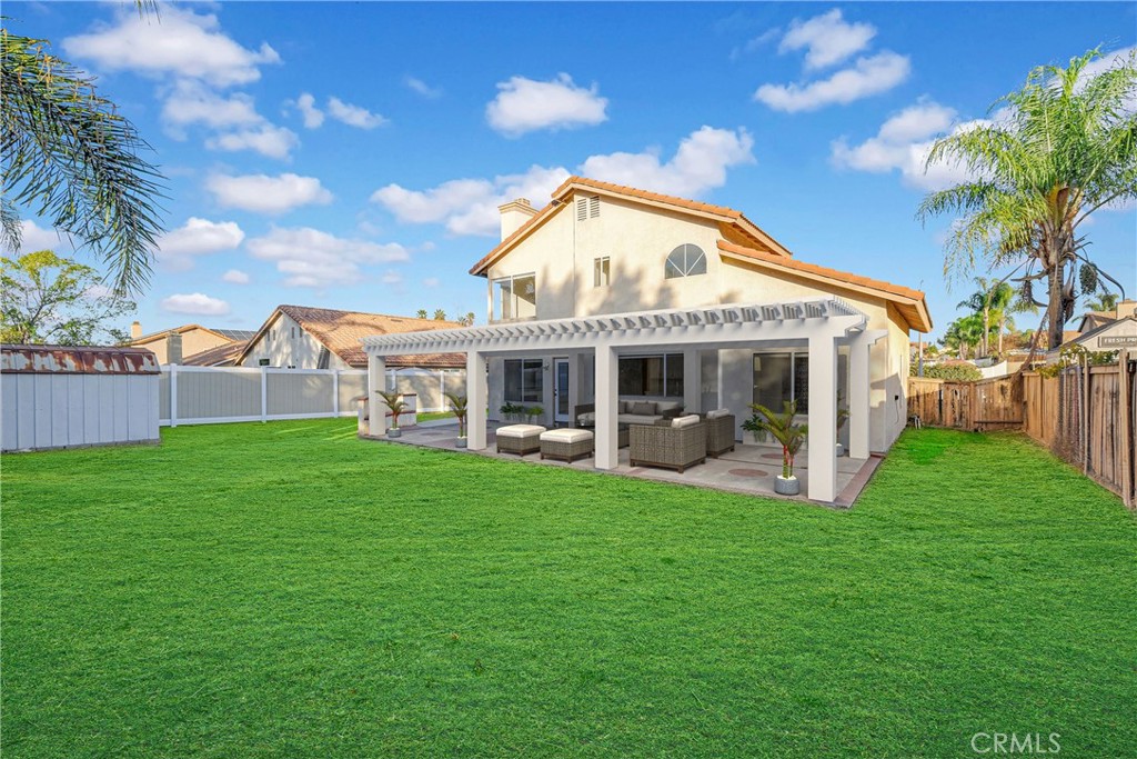 9253 Sunridge Drive Riverside, CA 92508 - Photo 36 of 54 a view of a house with backyard porch and garden