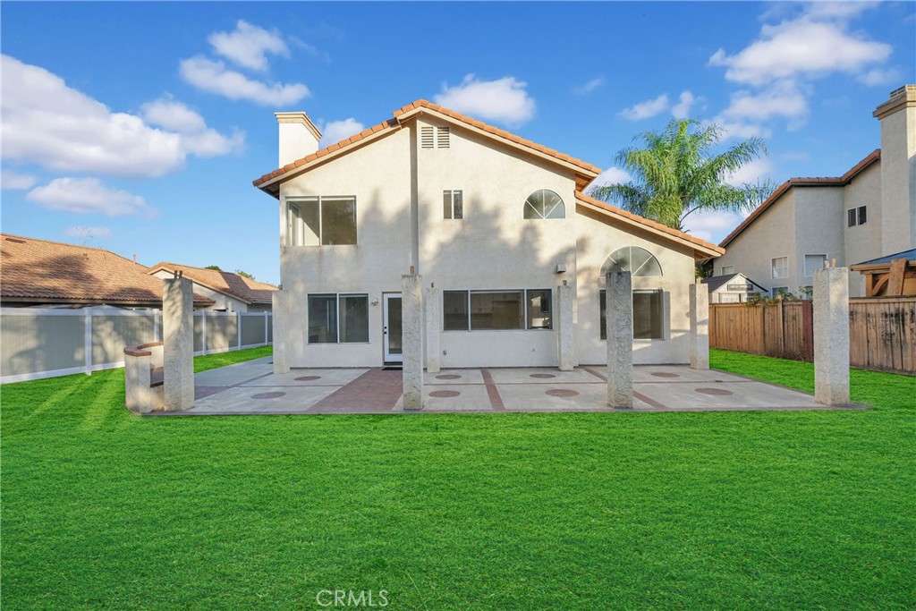9253 Sunridge Drive Riverside, CA 92508 - Photo 38 of 54 a front view of house with yard and green space