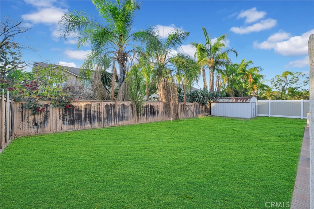 9253 Sunridge Drive Riverside, CA 92508 - Photo 39 of 54 a view of yard with a house in the background