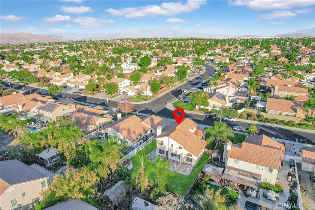 9253 Sunridge Drive Riverside, CA 92508 - Photo 45 of 54 an aerial view of residential houses with outdoor space and trees