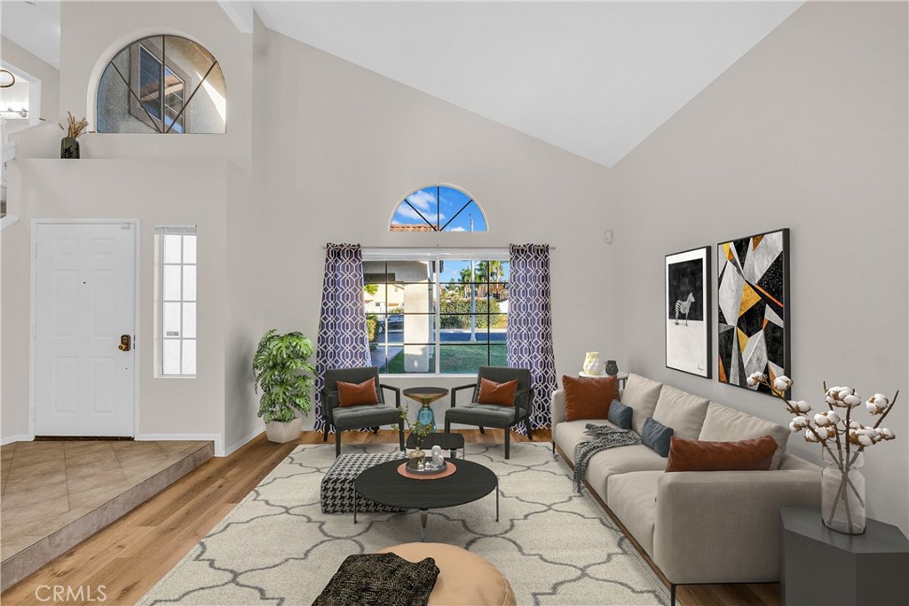 9253 Sunridge Drive Riverside, CA 92508 - Photo 5 of 54 a living room with furniture a rug and a window