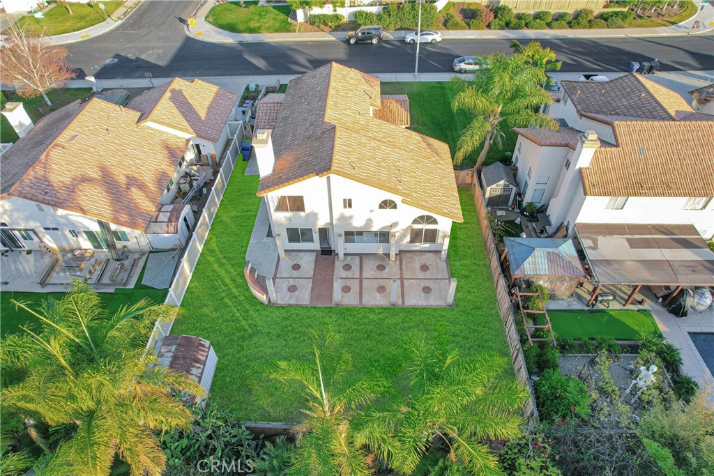 9253 Sunridge Drive Riverside, CA 92508 - Photo 52 of 54 an aerial view of a house with a garden and plants