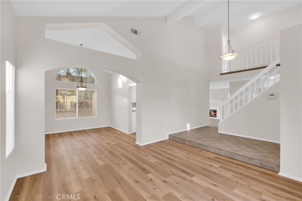 9253 Sunridge Drive Riverside, CA 92508 - Photo 8 of 54 a view of empty room with wooden floor