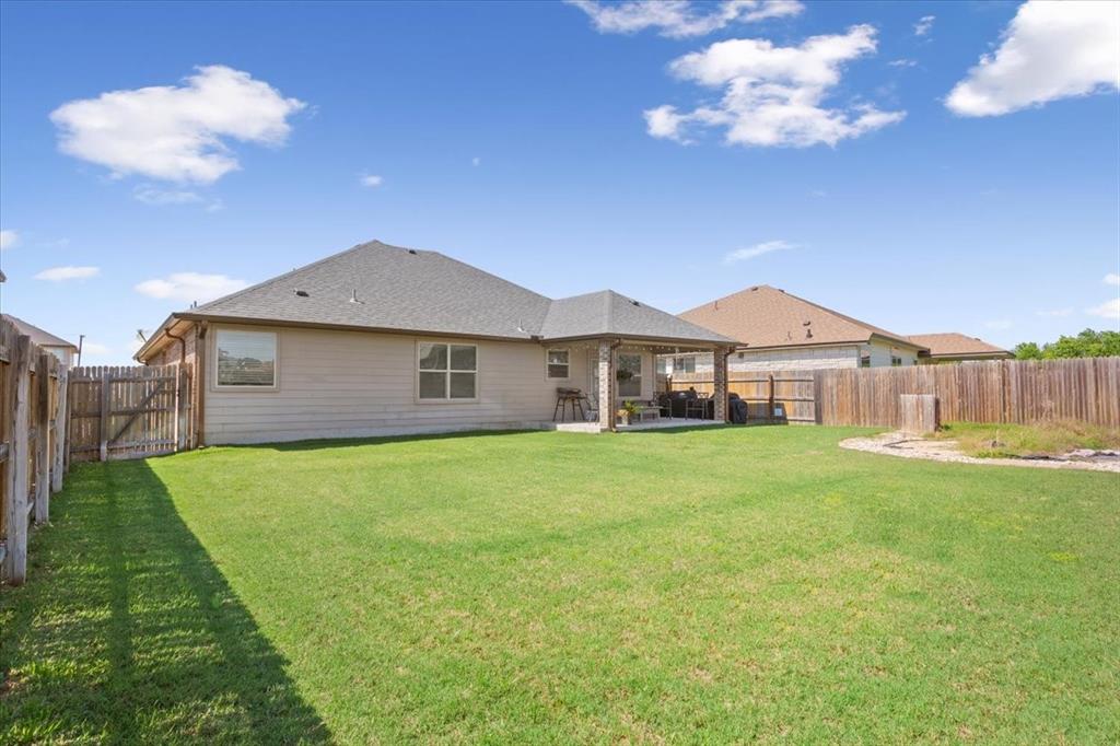 5308 Tama Drive Waco, TX 76708 - Photo 27 of 29 a view of a house with a backyard