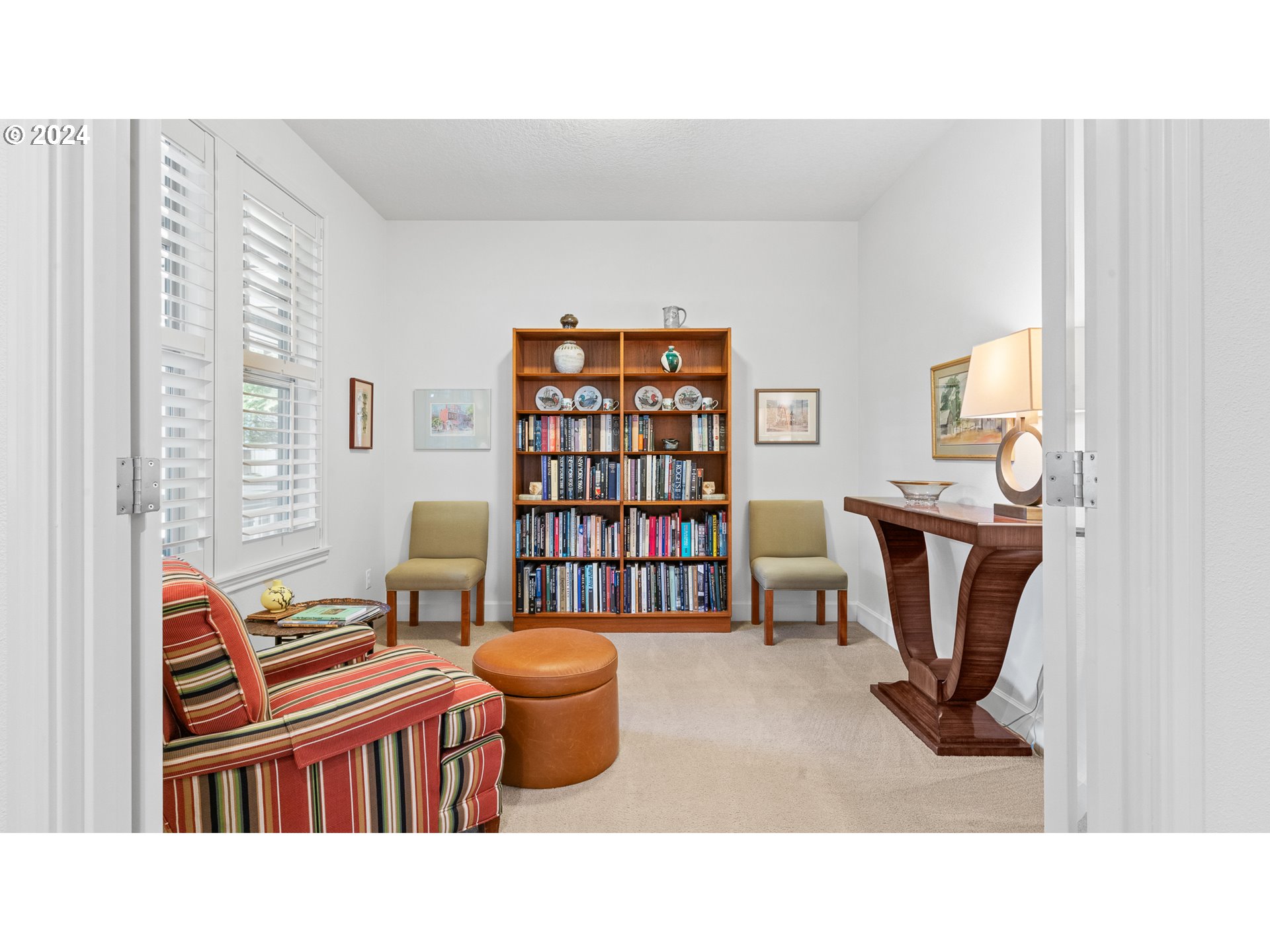 4511 Oakridge Road Lake Oswego, OR 97035 - Photo 15 of 44 a living room with furniture and a bookshelf