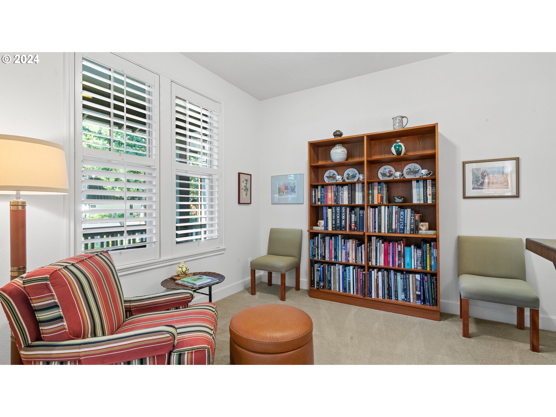 4511 Oakridge Road Lake Oswego, OR 97035 - Photo 16 of 44 a living room with furniture and a book shelf