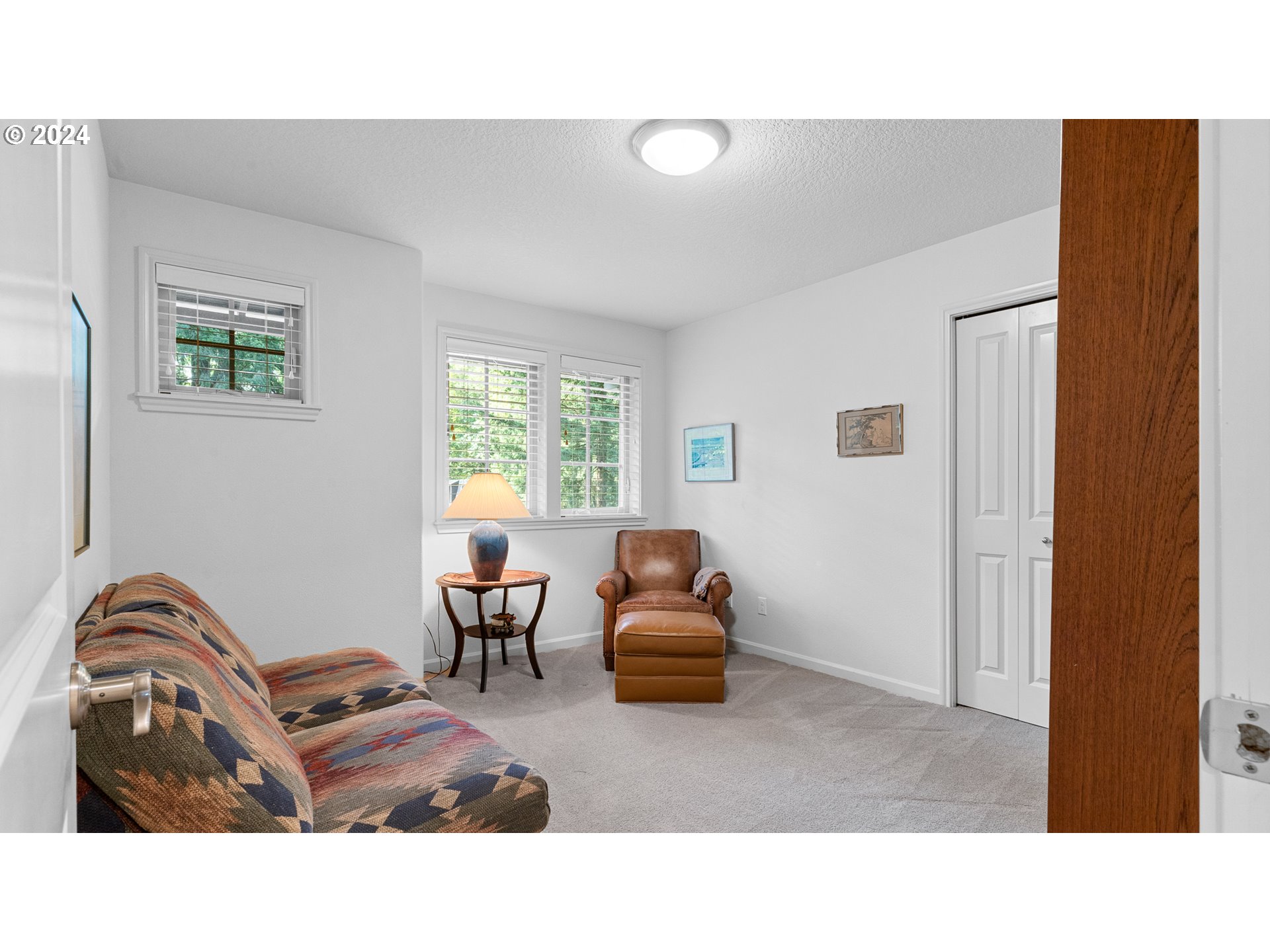 4511 Oakridge Road Lake Oswego, OR 97035 - Photo 17 of 44 a living room with furniture and a window