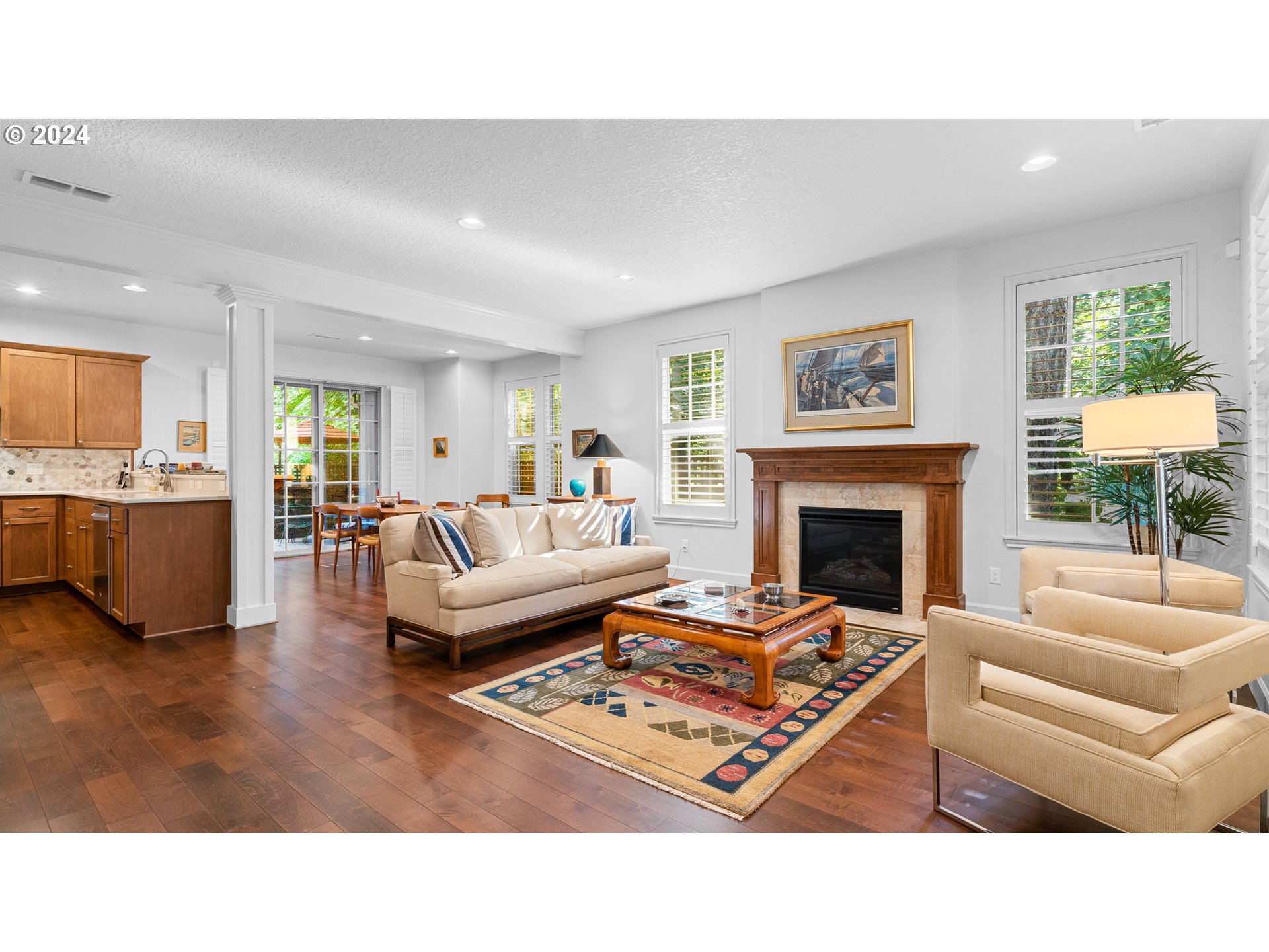 4511 Oakridge Road Lake Oswego, OR 97035 - Photo 2 of 44 a living room with furniture and a fireplace