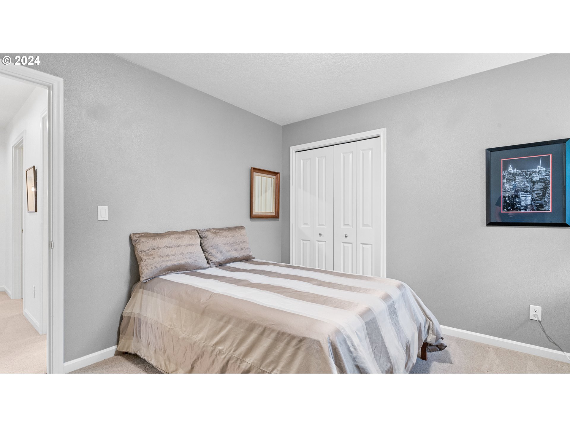 4511 Oakridge Road Lake Oswego, OR 97035 - Photo 21 of 44 a bedroom with a bed and painting