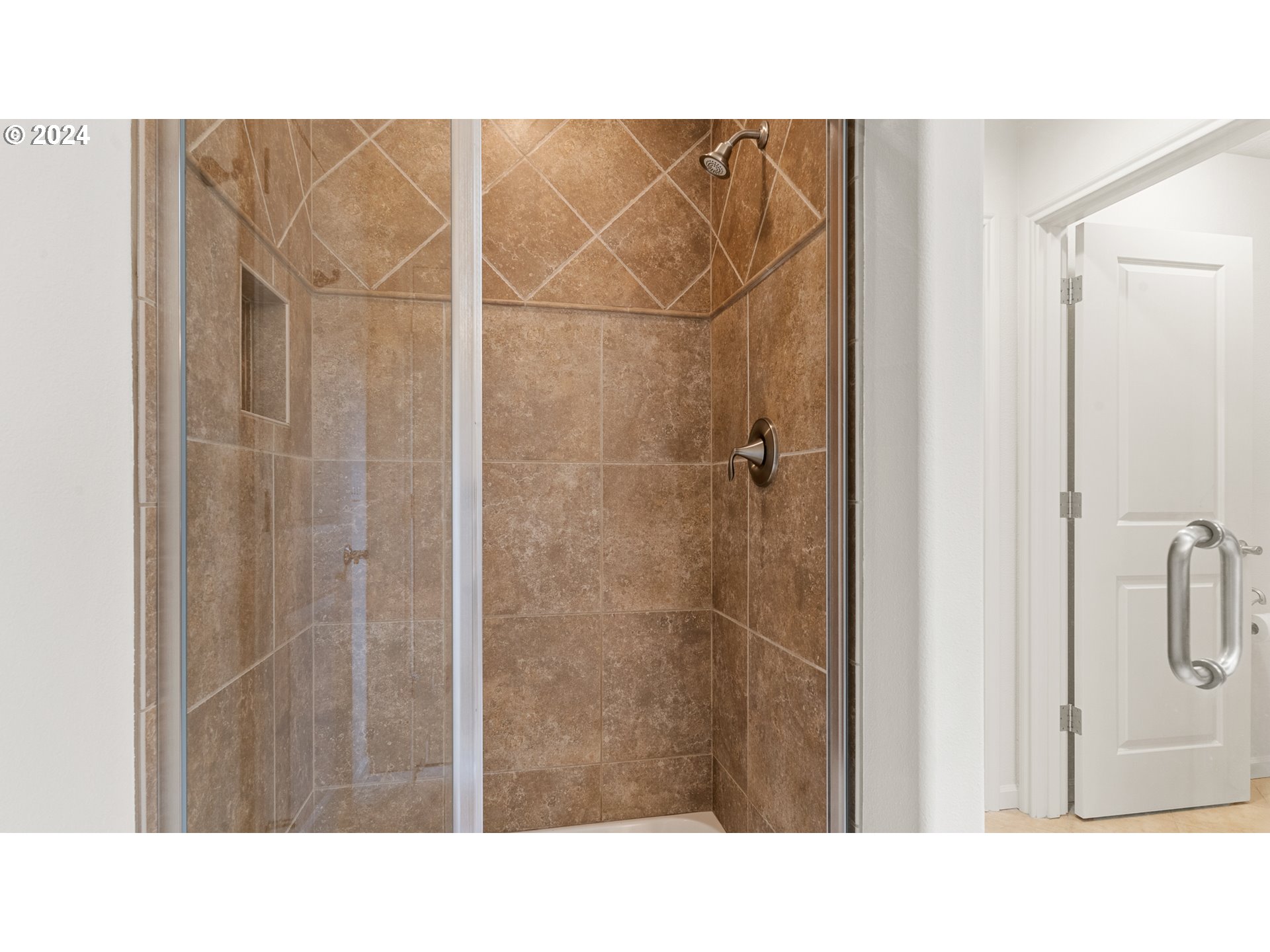 4511 Oakridge Road Lake Oswego, OR 97035 - Photo 30 of 44 a bathroom with a shower and a sink