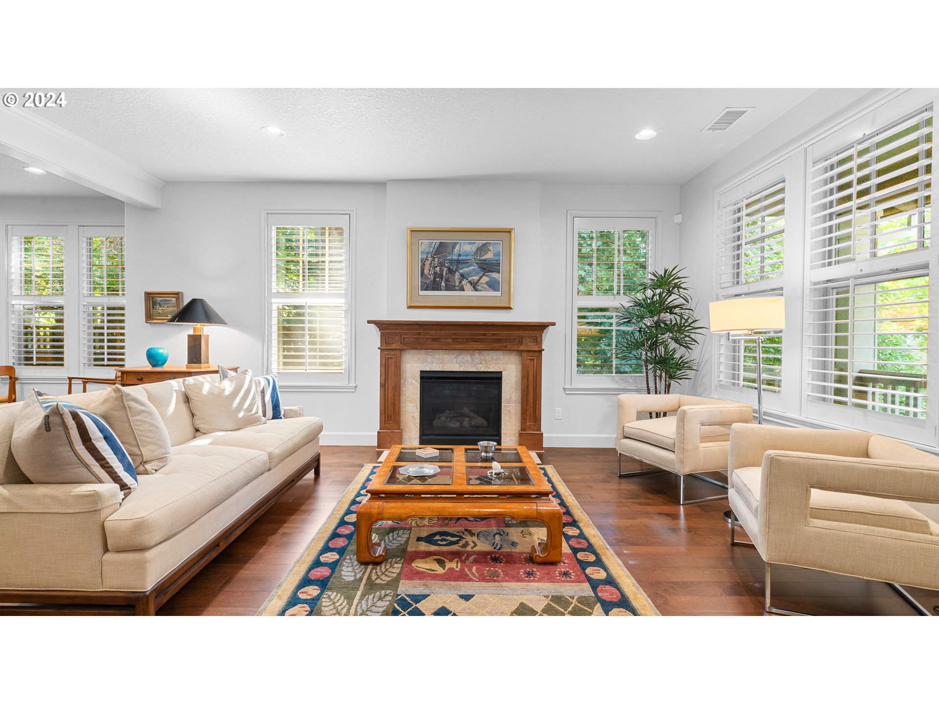 4511 Oakridge Road Lake Oswego, OR 97035 - Photo 3 of 44 a living room with furniture windows and a fireplace