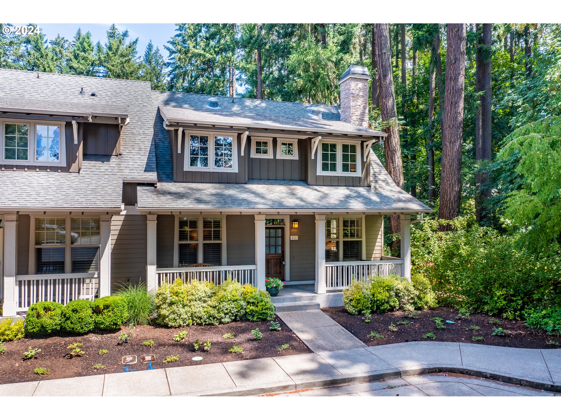 4511 Oakridge Road Lake Oswego, OR 97035 - Photo 38 of 44 a view of front a house with a garden