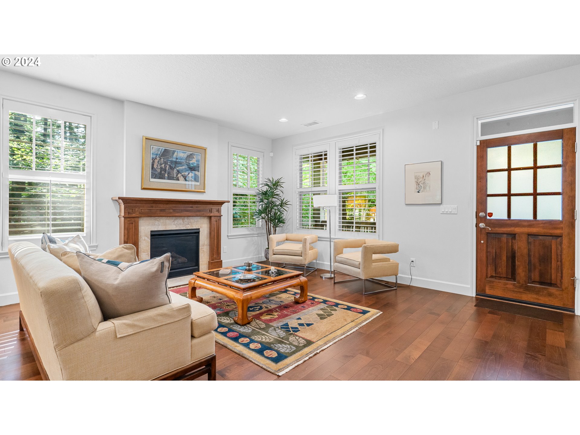 4511 Oakridge Road Lake Oswego, OR 97035 - Photo 4 of 44 a living room with furniture and a fireplace